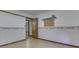 Bedroom with wallpaper, an open doorway, and wood-look floors at 31 N Restin Rd, Greenwood, IN 46142