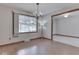 The dining area showcases stylish hardwood floors and a view to the home's front yard at 31 N Restin Rd, Greenwood, IN 46142