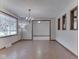Dining room with chandelier, hardwood floors, large window, and an open concept feel at 31 N Restin Rd, Greenwood, IN 46142