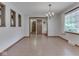 View of the dining room featuring wood floors, unique decor, and natural light at 31 N Restin Rd, Greenwood, IN 46142