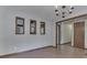 Charming dining room featuring beautiful wood floors and stylish light fixture at 31 N Restin Rd, Greenwood, IN 46142