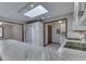 Bright kitchen features white cabinets, marble countertops, and skylight at 31 N Restin Rd, Greenwood, IN 46142