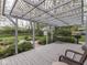 Relaxing patio with pergola, table, chairs and grill for enjoying the outdoors at 31 N Restin Rd, Greenwood, IN 46142