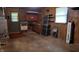 Basement area offering workspace, shelves, and utility connections at 3412 Loral Dr, Anderson, IN 46013