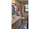 Functional bathroom with vanity, toilet, and tiled floor, offering a clean and practical space at 3412 Loral Dr, Anderson, IN 46013