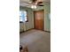 Neutral bedroom with carpet and a closet, offering a simple and comfortable retreat at 3412 Loral Dr, Anderson, IN 46013
