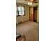 Bright bedroom with natural light, closet, and carpet, offering a simple and comfortable retreat at 3412 Loral Dr, Anderson, IN 46013