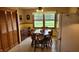 Eat-in kitchen with table and chairs, lots of natural light and view to the outside at 3412 Loral Dr, Anderson, IN 46013