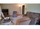 Cozy living room featuring comfortable seating arrangements and neutral tones, perfect for relaxation at 3412 Loral Dr, Anderson, IN 46013
