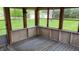 Enclosed porch with striped carpet, providing a bright space at 3412 Loral Dr, Anderson, IN 46013