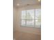 Bedroom featuring neutral carpet, large windows, and blinds, providing great sunlight at 3438 Windy Knoll Ln, Carmel, IN 46074