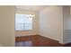 Dining room with hardwood floors, a chandelier, and natural light at 3438 Windy Knoll Ln, Carmel, IN 46074