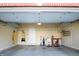 The large garage has built-in shelving for maximum storage and organization at 3438 Windy Knoll Ln, Carmel, IN 46074