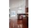 Open concept kitchen area with stainless steel appliances and granite countertop island at 3438 Windy Knoll Ln, Carmel, IN 46074