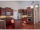 Gourmet kitchen boasts stainless steel appliances and granite countertops at 3438 Windy Knoll Ln, Carmel, IN 46074