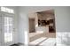 Bright and open living space leading to kitchen area at 3438 Windy Knoll Ln, Carmel, IN 46074