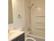 Cozy bathroom with tub, new fixtures, and vanity at 3453 Payton Ave, Indianapolis, IN 46226