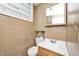 Small bathroom includes a sink, vanity, and toilet at 3514 Eisenhower Dr, Indianapolis, IN 46224