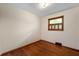 Neutral bedroom with hardwood floors and natural light from one window at 3605 Redfern Dr, Indianapolis, IN 46237