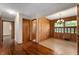 Hallway connecting to a breakfast nook with lots of storage cabinets at 3605 Redfern Dr, Indianapolis, IN 46237
