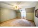 Neutral bedroom featuring carpet, large window, and slanted ceilings at 3660 S Conservation Club Rd, Morgantown, IN 46160