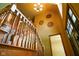 Bright entryway features wooden stairs, front door with sidelights, and decorative accents at 3660 S Conservation Club Rd, Morgantown, IN 46160