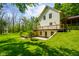 Two story home with a walk-out basement and a lush yard at 3660 S Conservation Club Rd, Morgantown, IN 46160