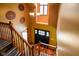 Grand foyer featuring high ceilings, staircase, and chandelier at 3660 S Conservation Club Rd, Morgantown, IN 46160