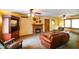 Cozy living room with a fireplace, comfortable seating, and ample natural light at 3660 S Conservation Club Rd, Morgantown, IN 46160