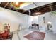 Finished basement featuring office space and a cozy seating area at 3744 S Meridian St, Indianapolis, IN 46217
