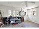 Well-lit garage featuring white brick, a sturdy work table, storage cabinets, and ample space for various tools and equipment at 3744 S Meridian St, Indianapolis, IN 46217