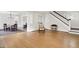 Bright and spacious living room features hardwood floors, white trim, and an open floor plan at 3744 S Meridian St, Indianapolis, IN 46217