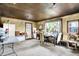 Room featuring a table and chairs near windows with tree views at 3975 Denwood Dr, Indianapolis, IN 46226
