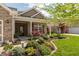 Charming home exterior with a manicured lawn, well-kept garden, and welcoming front porch at 4281 Cairo Way, Avon, IN 46123