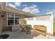 Cozy patio area with outdoor seating, perfect for relaxation, gardening, and backyard enjoyment at 4281 Cairo Way, Avon, IN 46123