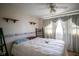 Cozy bedroom with a plush bed, soft lighting, and serene decor at 4429 Iowa St, Clayton, IN 46118