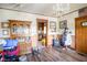 Inviting dining room with hardwood floors, classic chandelier, and natural light, perfect for Gathering gatherings at 4429 Iowa St, Clayton, IN 46118