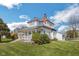 Charming two-story home with a welcoming front porch and well-maintained lawn, perfect for relaxing outdoors at 4429 Iowa St, Clayton, IN 46118