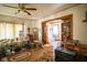 Spacious living room featuring hardwood floors, neutral walls, and natural light, creating a warm and inviting atmosphere at 4429 Iowa St, Clayton, IN 46118