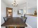 Charming dining room features a wooden table and chairs, plus a vintage hutch at 4615 Copper Grove Dr, Indianapolis, IN 46237