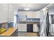 Efficient kitchen featuring stainless steel appliances and ample cabinet space at 4615 Copper Grove Dr, Indianapolis, IN 46237