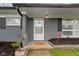Cozy front porch with brickwork and a welcoming entrance at 4720 E 42Nd St, Indianapolis, IN 46226