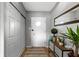 Inviting hallway with a closet, decorative rug and side table at 4720 E 42Nd St, Indianapolis, IN 46226