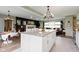 Kitchen with a large island, great for entertaining, and connecting to the living room at 4720 E 42Nd St, Indianapolis, IN 46226