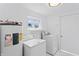 Laundry room featuring white washer and dryer at 4721 E Morris St, Indianapolis, IN 46203