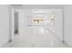 Bright living room with fresh paint and new tile flooring at 4721 E Morris St, Indianapolis, IN 46203