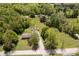 Lush residential area showing verdant trees and sprawling lawns under a partly cloudy sky at 503 E Bunker Hill Rd, Mooresville, IN 46158