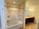 Bright bathroom featuring shower-tub combo and dual vanity at 5313 Brandywine Dr, Whitestown, IN 46075