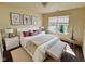 Cozy bedroom with a large bed, neutral tones, and a bench to complement the space at 5313 Brandywine Dr, Whitestown, IN 46075