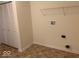 Compact laundry space with closet and access for the dryer and washer at 5313 Brandywine Dr, Whitestown, IN 46075
